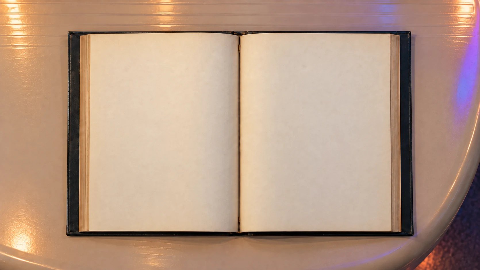 An open archival book photographed from above on a softly lit reflective table.